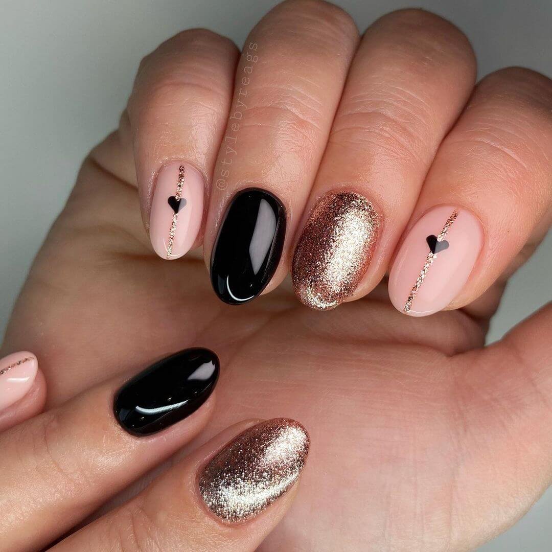 black & gold Valentine nails
