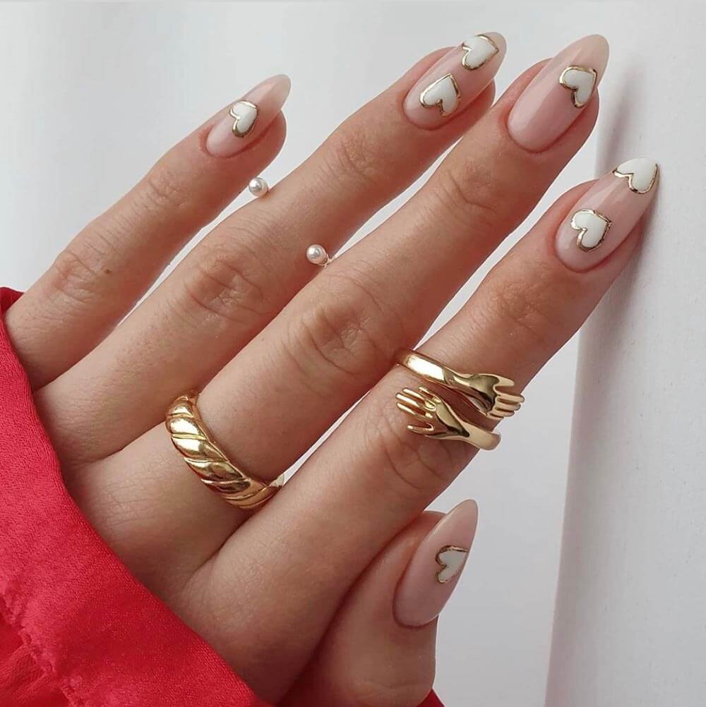 nude and white heart nails design