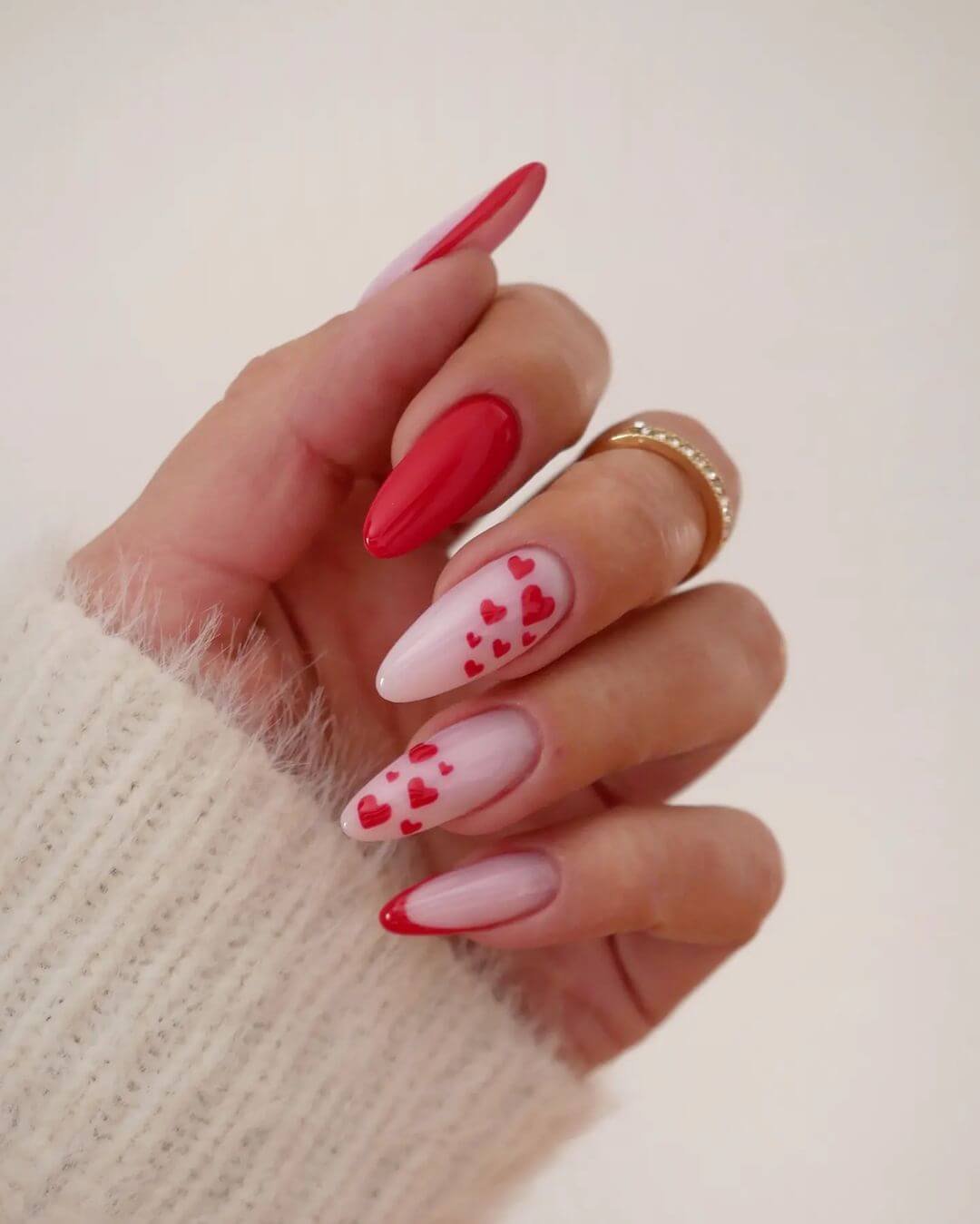 Valentine nails: red hearts design