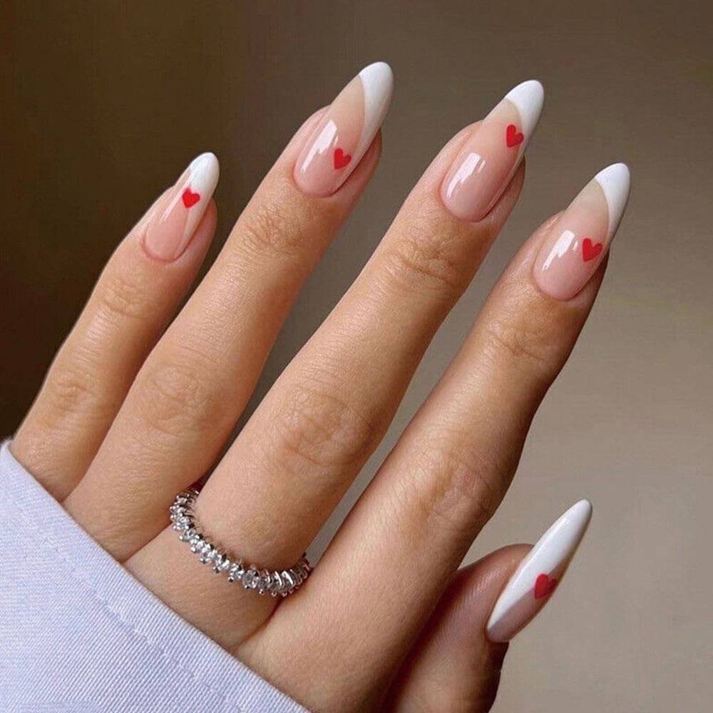 white French nails with hearts