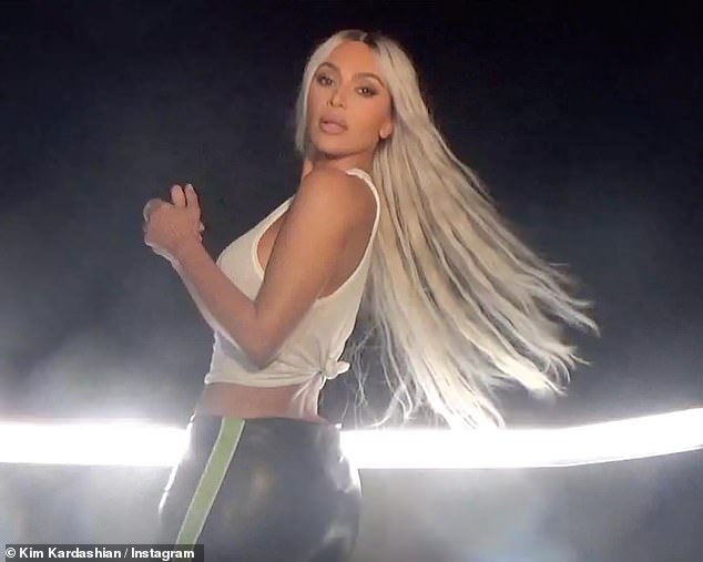 Kim Kardashian, 43, joined a bevy of other A-listers as she proudly displayed her new Tesla Cybertruck with an Instagram photoshoot posted on Wednesday