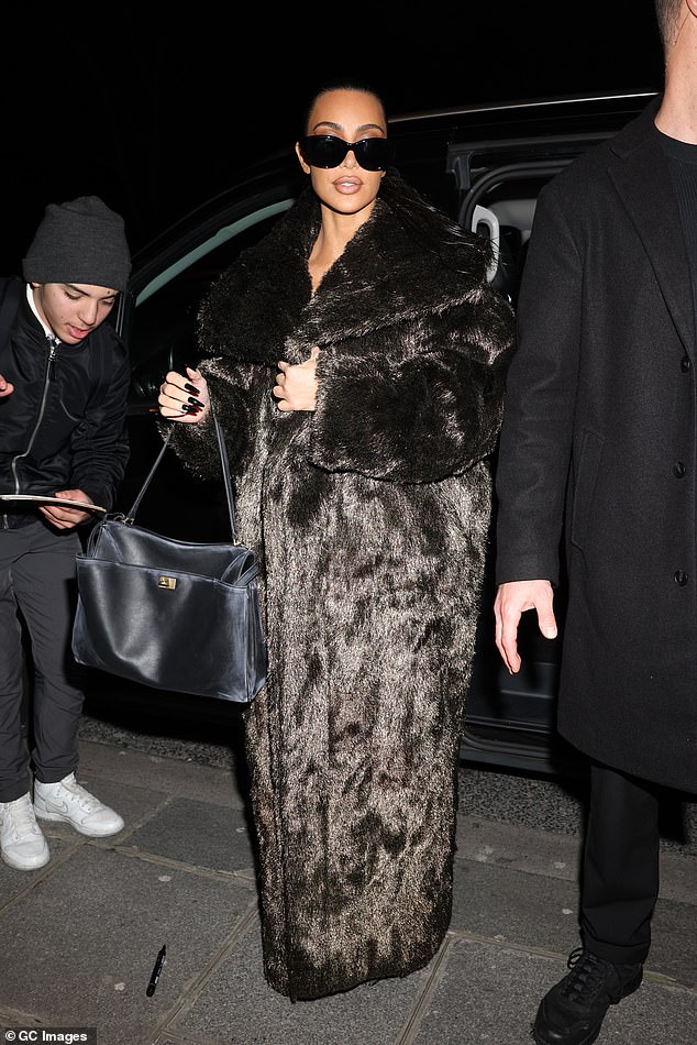 Kim attempted to keep a low-profile as she stepped out in an oversized jacket and dark-rimmed glasses