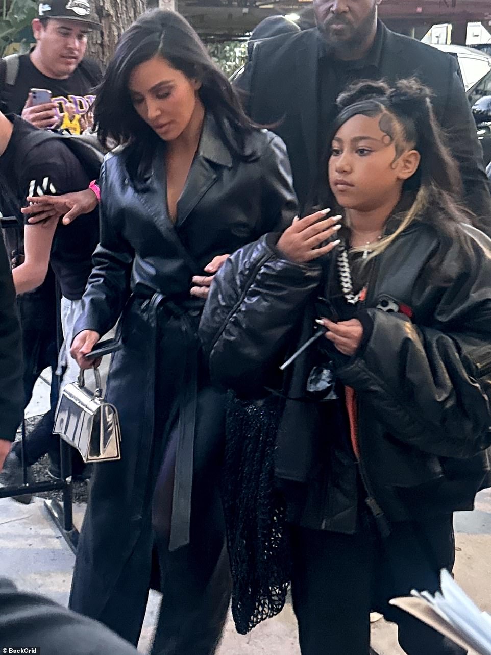 Kim later stepped out with 10-year-old daughter North West on Tuesday night for the Los Angeles Lakers game