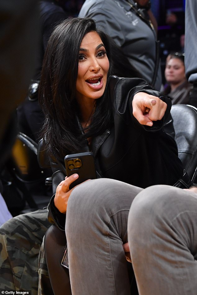 Kim appeared to be having a blast at the game