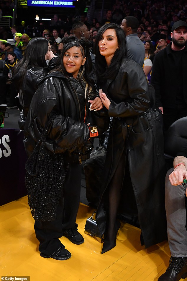 Kim was at the game with a pal, plus her daughter North, 10, and North's friend