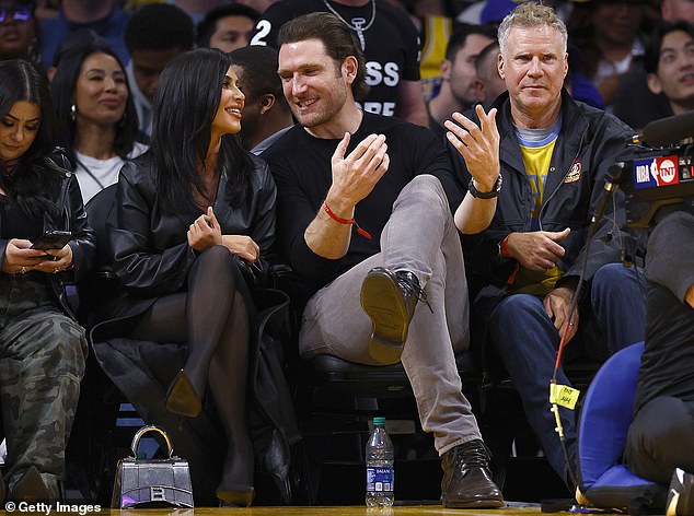 Kim Kardashian chatted up with pal Peter Cornell, whom she had previously met when she was with now-ex husband Kris Humphries; Kim seen with Peter, with actor Will Ferrell on the right