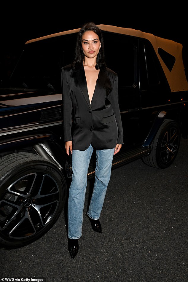 The runway maven completed the look with straight-leg jeans and heels