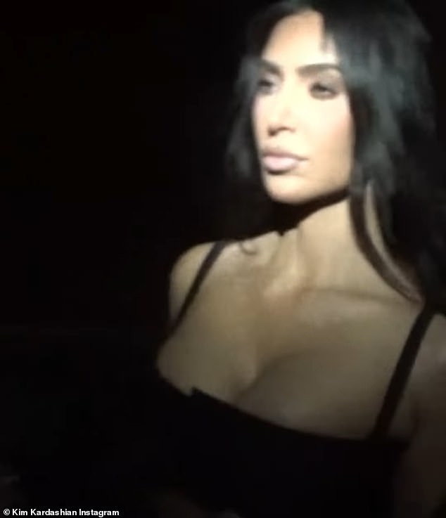 The Kardashians star also included a short reel that was filmed in a dimly lit space with a flashlight shining on her