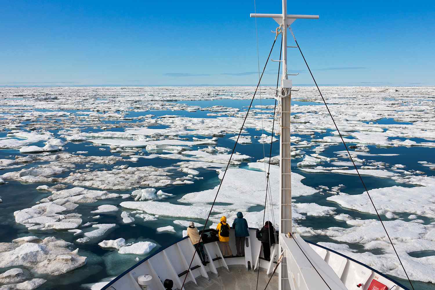 Cruise ship sailing through floating ice on Bering Sea, Russia Far East