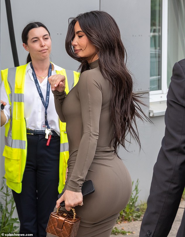 Quick trip: Kim Kardashian jetted out of Berlin on Wednesday after making an appearance at the Super Return International conference