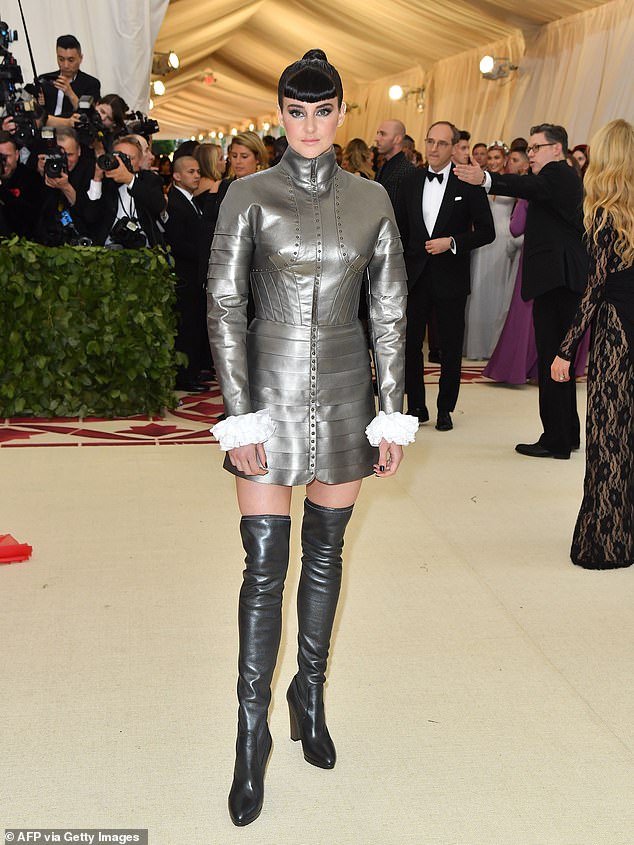 Shailene Woodley wore a silver minidress with kinky boots for the 2018 Met Gala on May 7, 2018