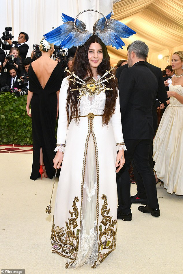 Lana Del Rey's look was interesting at Heavenly Bodies: Fashion & The Catholic Imagination Costume Institute Gala on May 7, 2018