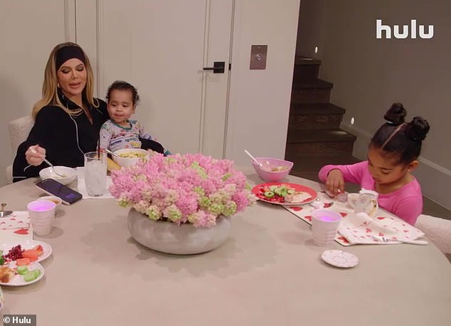 Khloe then says that she is 'very happy' as she is seen playing with her two kids True and Tristan