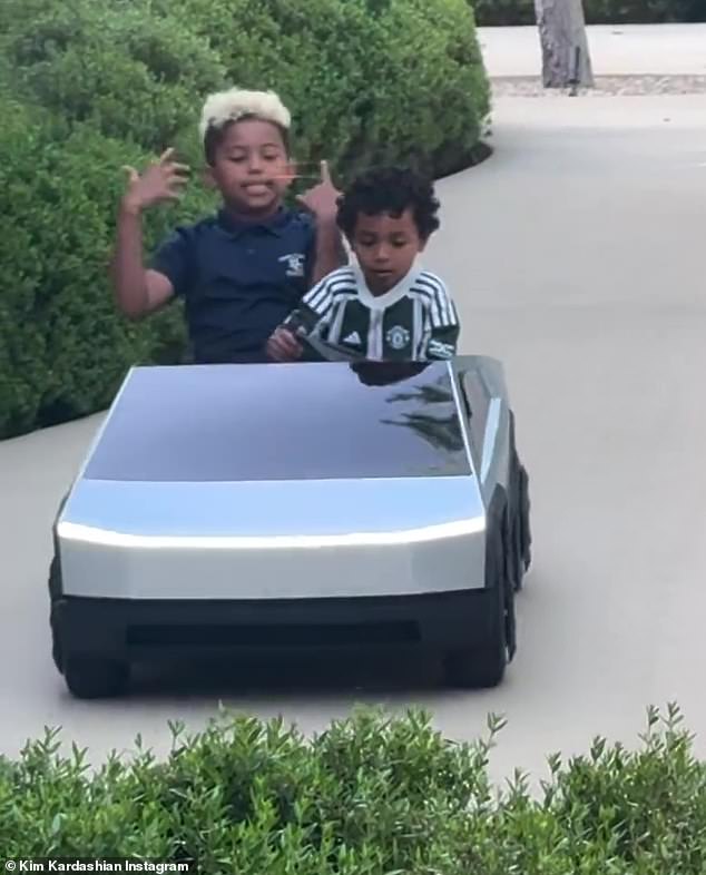 The boys seemed to be having the time of their life as they drove around the property