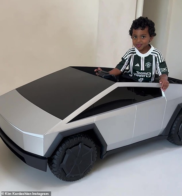 Kim Kardashian 's youngest child Psalm got a very big birthday present as he turned age five on Thursday. His generous grandmother Kris Jenner bought the mini-me son of Kanye West a small version of a Tesla Cybertruck