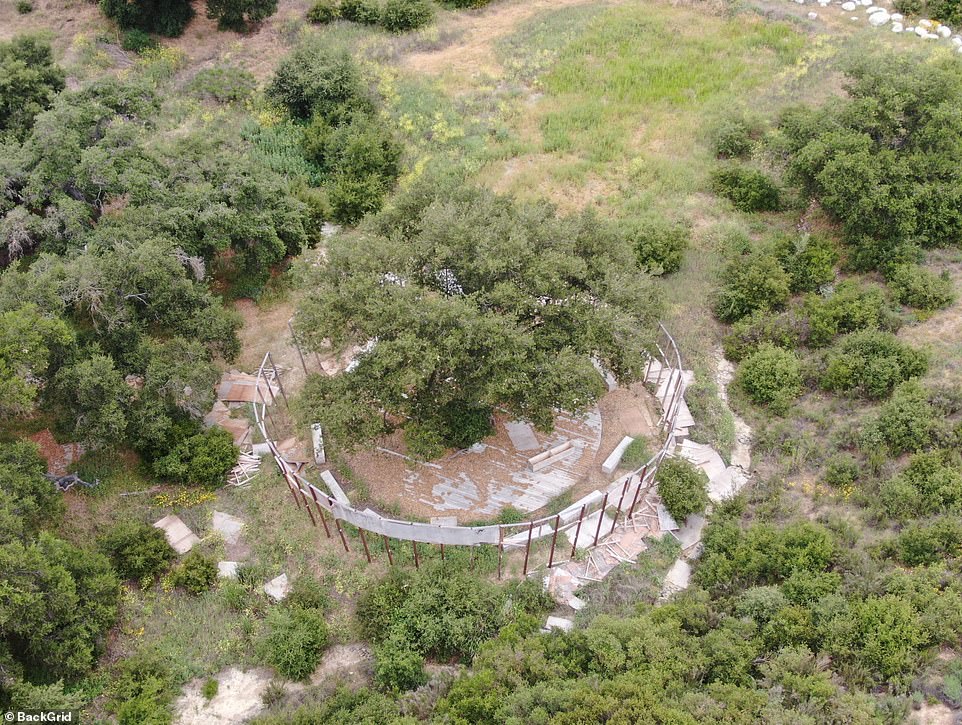 A circular patch outside of the home was bordered by a fencing that has also begun to fall apart - and appeared to be the location of one Ye's domes that he had built