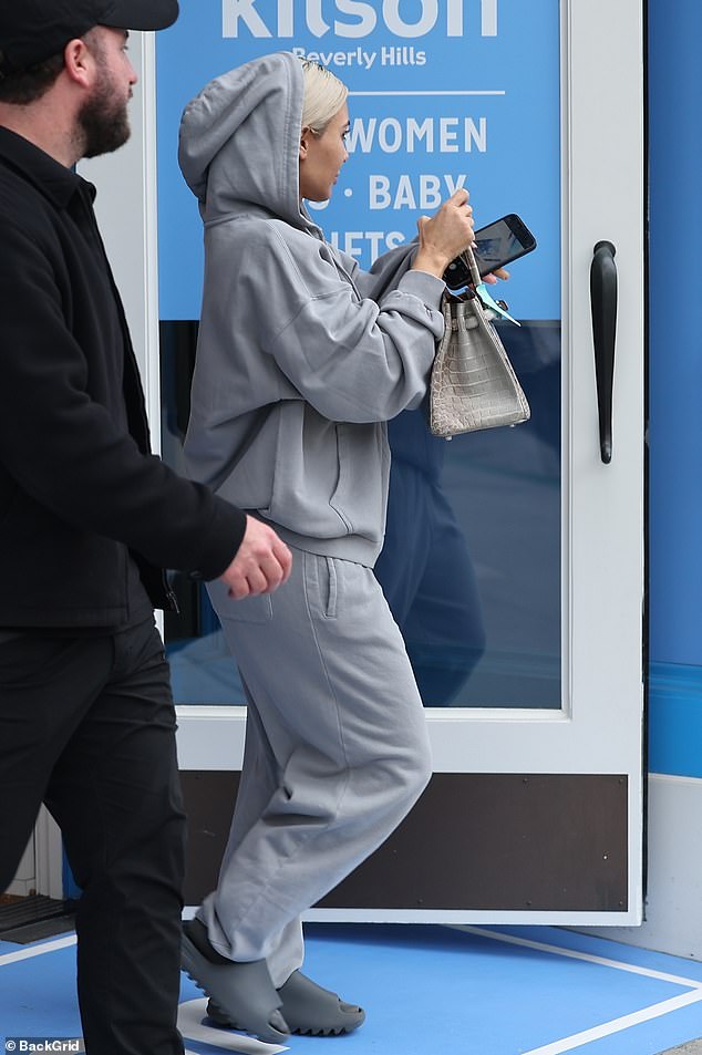 The 42-year-old reality star rocked a casual ensemble of grey sweats as she visited Kitson in Beverly Hills