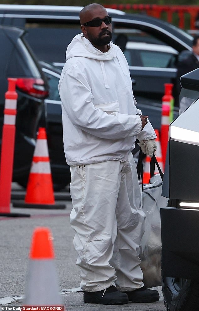 North's dad Kanye West was spotted stepping out in a white hoodie as he arrived to watch the live-to-film concert event