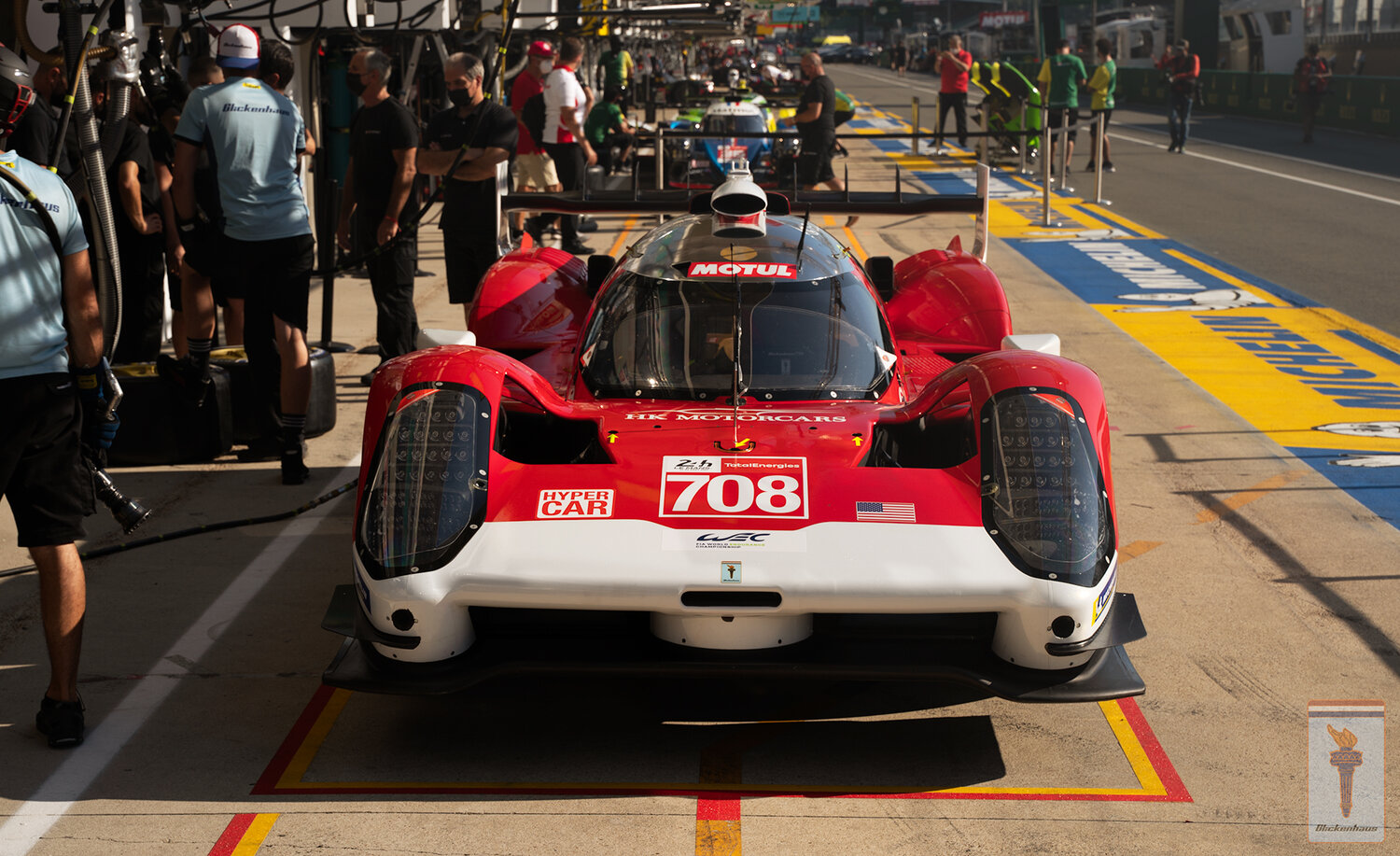 Red Glickenhaus 007 LMH with number 708 on front at 24 Hours of Le Mans