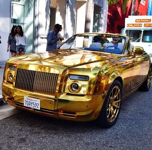 The Epitome of Luxury: The Gold Rolls-Royce