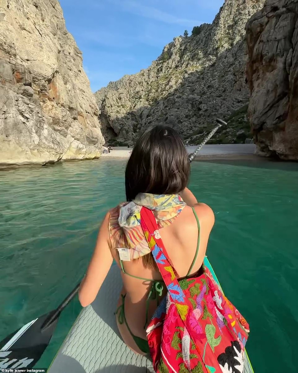 The friend had an embroidered purse over her shoulder