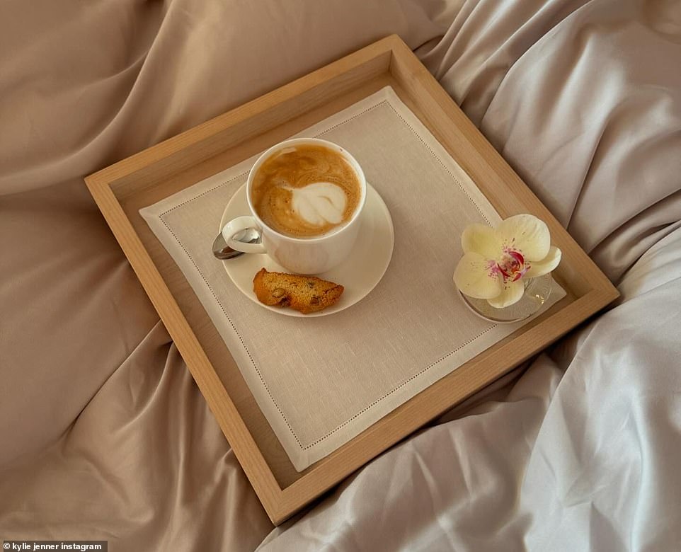 Kylie also gave fans a look at her morning cappuccino with a biscotti on the side