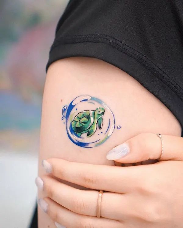 Bubble and turtle tattoo by @eden_tattoo_