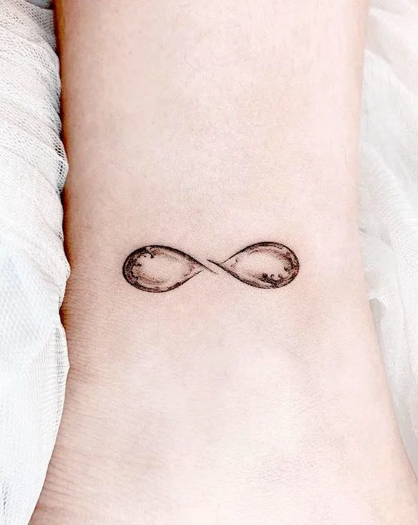 Water infinity symbol tattoo by @woonatattoo