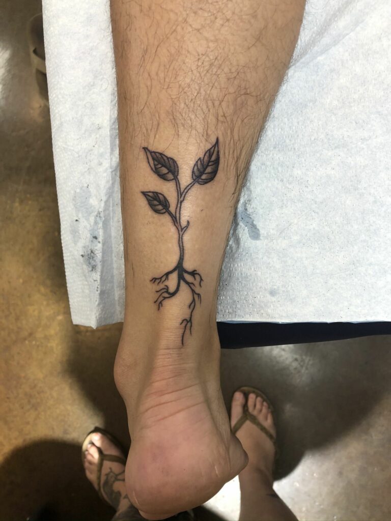 tiny sapling tattoo