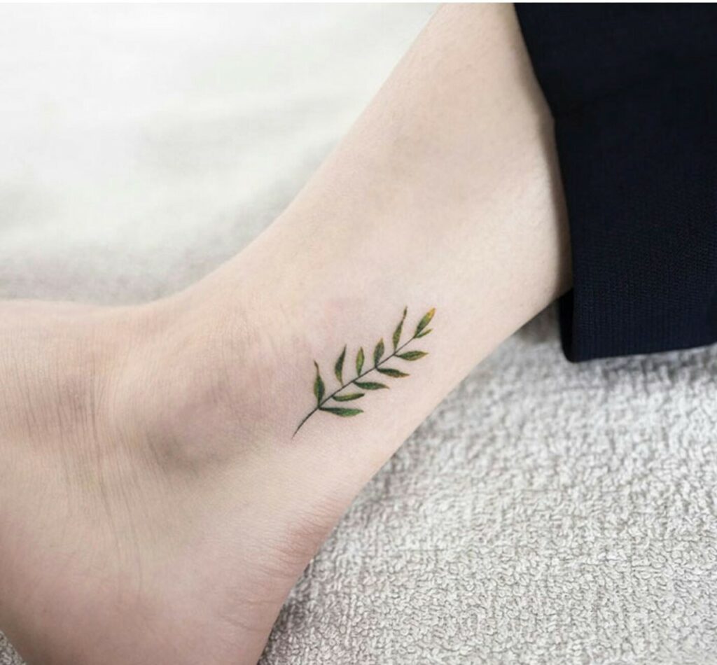 tiny sapling tattoo