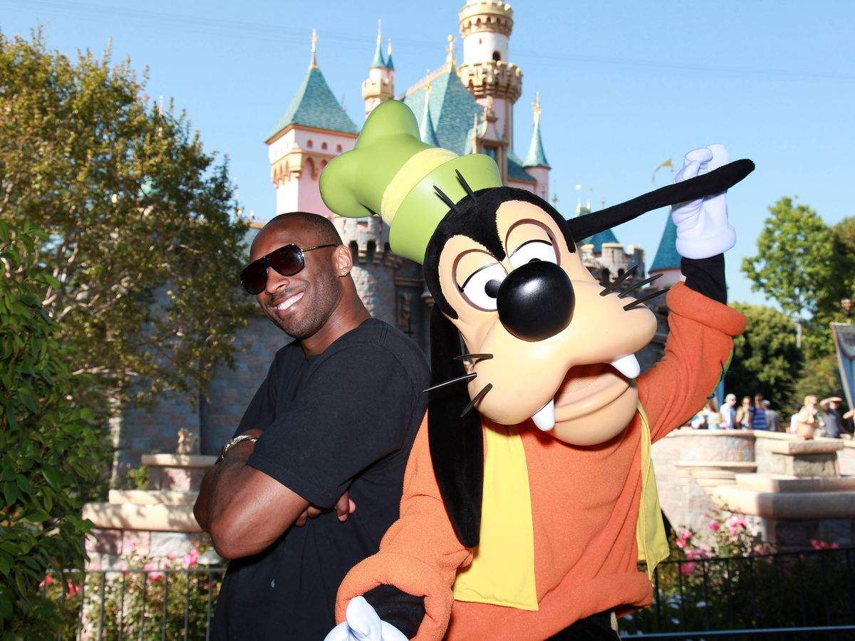 Kobe Bryant's magical family moment: Celebrating the Lakers' NBA championship victory at Disneyland with his wife Vanessa and daughters Natalia and Gianna in 2010