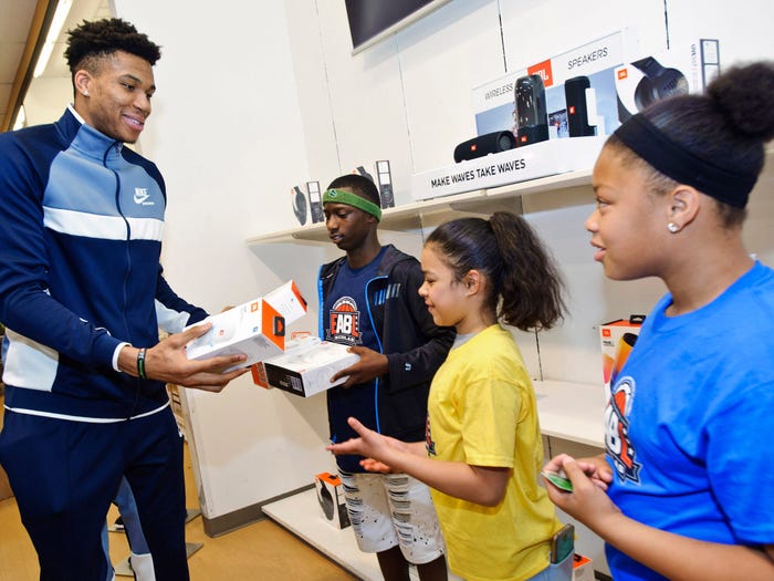 Giannis Antetokounmpo surprises kids with new JBL gear.